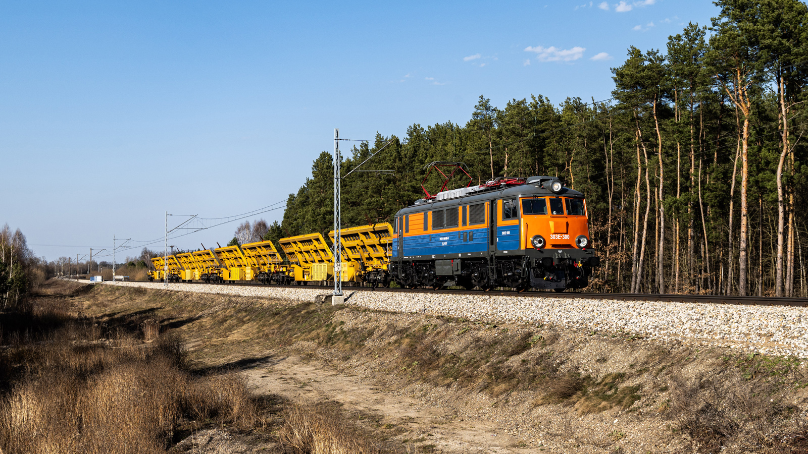 303E-300